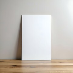 Simple and elegant blank canvas mockup with a wooden table and grey background.