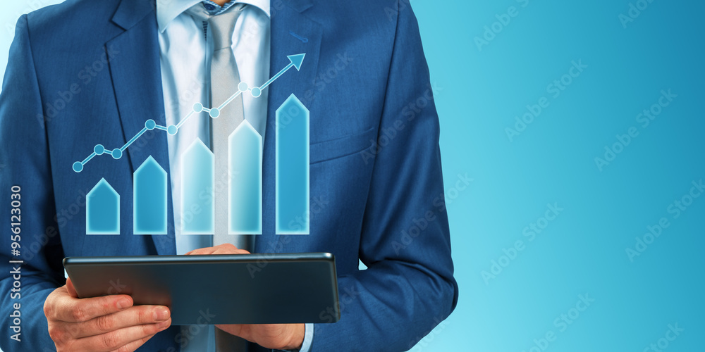 Poster close up of businessman hands using tablet with abstract creative growing business chart on blue bac