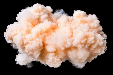 Dramatic explosion of orange smoke against a black background