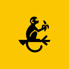 silhouette of a monkey with a banana vector logo