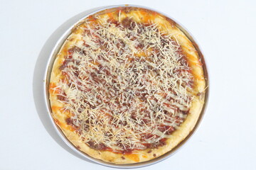 Pizza with meat topping coated with mayonnaise