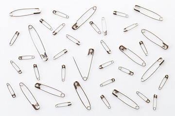 Set of big and small size silver safety pins.