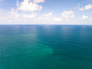 Obraz premium Drone view Beautiful clouds blue sky over sea in high season at Phuket Thailand