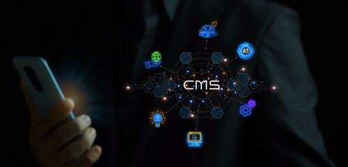 CMS, Content management system concept for business website management. Businessman showing glowing...