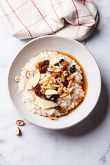 Bircher muesli with apple, raisins and nuts.