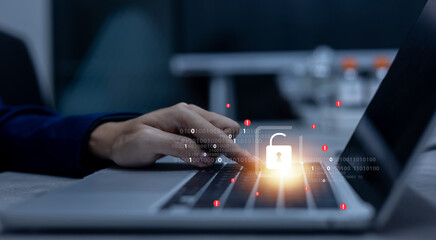 close up hacker man hand type password to unlock system after hacking with binary code in private dark operation room for digital information and leakage GDPR data concept