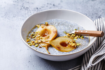 Chia pudding with caramelized pear and pistachio.