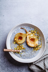 Chia pudding with caramelized pear and pistachio.