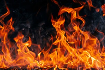Fototapeta premium Fire flames on a black background