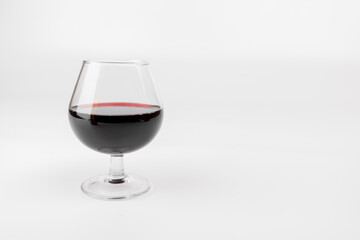 Left-Aligned Red Wine Glass with Clean White Background in Horizontal Layout