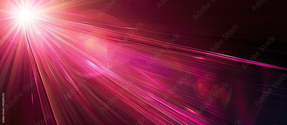 Poster black background showcasing an abstract pink lens flare creating rays of light with copy space image