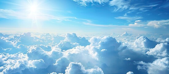 Blue sky with delicate white clouds a picturesque nature sky background with copy space image