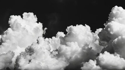 White clouds on black background. Black and white clouds in the sky isolated on dark background. Cloud texture and pattern for design, banner or wallpaper. © Usman