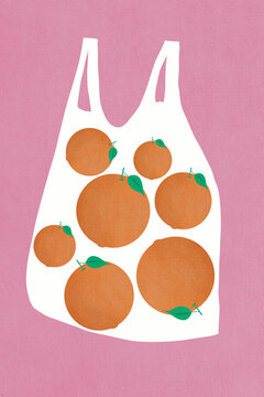 Oranges in reusable bag against pink background