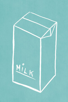 Milk carton against blue background