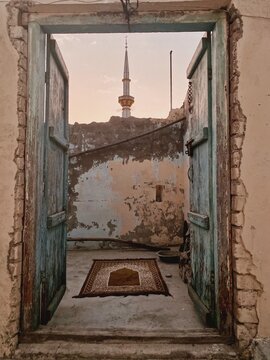 Prayer Mat In Front of Minaret