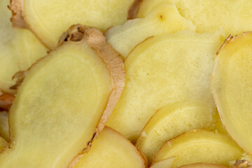 details of the ginger root used in cooking sliced into pieces