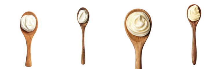 A white background is focused on sour cream, mayonnaise, yogurt and mayonnaise with a wooden spoon in the foreground, and the background is white.