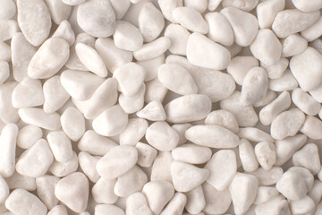 white stones pebble texture top view background