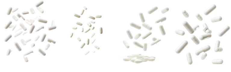 Isolated falling pills with full depth of field, isolated on white