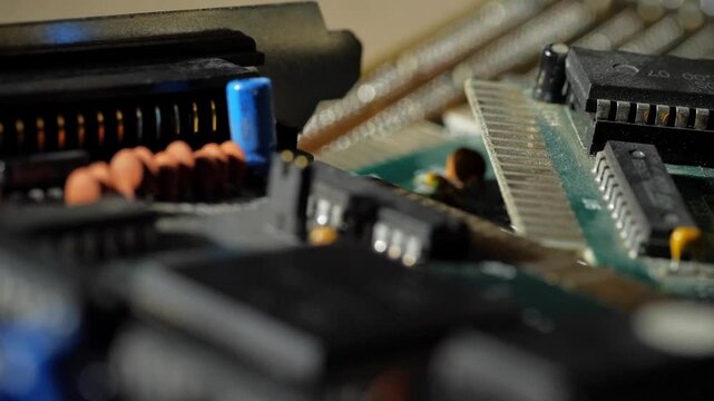 Old video cards, network cards and motherboards close-up