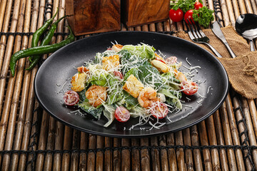 Tasty Caesar salad with prawn
