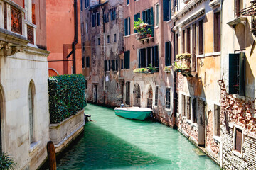 A stunning and beautiful view of a picturesque Venice canal, showcasing vibrant architecture and tranquil waters