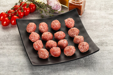 Uncooked raw beef meatball minced