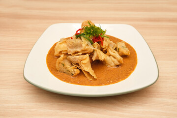 Batagor, made from fish or chicken dumpling, tofu, tapioca flour served with peanut sauce. Indonesian food

