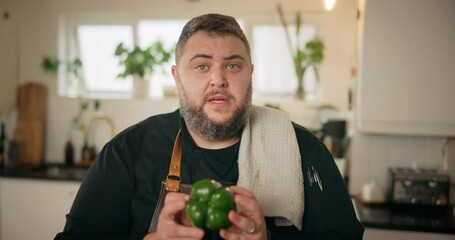 Cooking, vlog and chef live streaming in kitchen for video broadcast on social media. Man, filming or food blog in home for online tutorial, talk and tips with pepper for vegetable recipe in portrait