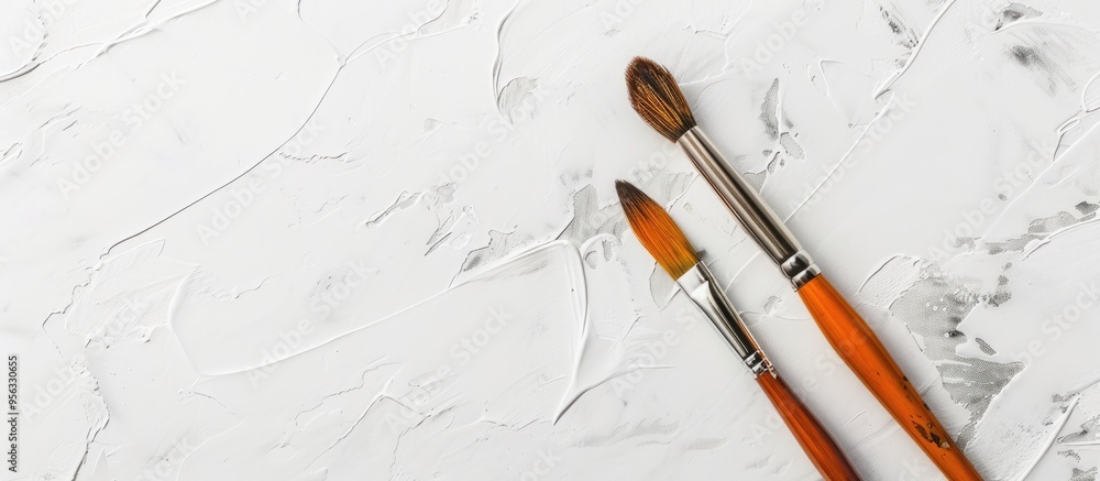 Aufkleber flat lay image of a paintbrush and watercolor set on a white surface ideal for painting or art conce