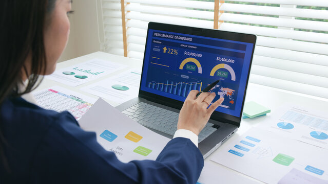 Asia people expert woman AI deep tech talent working on project predict sales insight SEO graph chart plan visual big data science report center BI smart tools screen. Office worker asian analyst job.