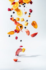 High speed photography of fruits and vegetables thrown into the air, Fruit Ninja, white background