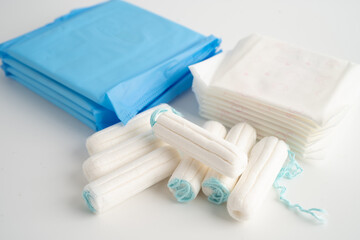 Menstruation cycle with sanitary pad and cotton tampon for woman hygiene and protection. © amazing studio