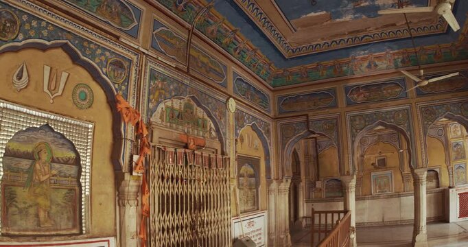 Old-painted Walls. Frescoes On Wall Of Hanuman Temple In Jaipur, India. Religious Motifs From Life Of Hanuman Are Painted. Monkey-like Deity, Son Of Wind God Vayu. Hanuman Also Known As Maruti