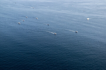 boats sail on the blue sea