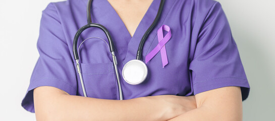 Doctor holding purple Ribbon for Violence, Pancreatic, Esophageal, Testicular cancer, Alzheimer,...