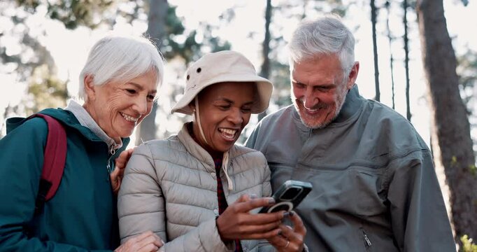 Hiking, laugh and friends in nature with phone, journey and funny video on internet. Happy, mobile and people in forest for streaming, comedy media or post on social networking app of fitness blooper