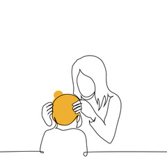 mother puts hat on baby - one line art vector. concept single mother, mother and child going for a walk