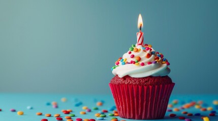 Brightly decorated cupcake with a candle on top. A red velvet treat topped with creamy frosting and colorful sprinkles. Perfect for celebrations and joyful moments. AI