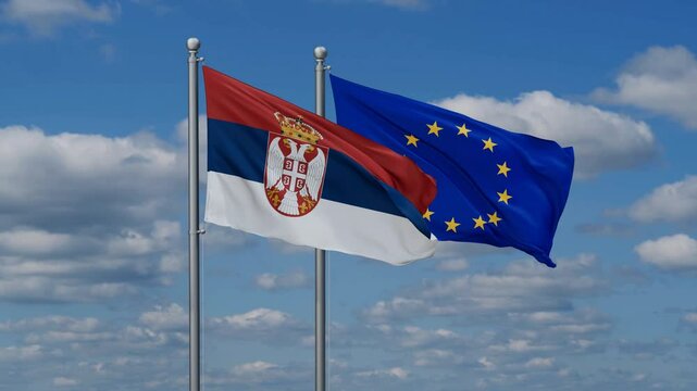 European Union and  Serbia flags flying together, video concept of the relationship