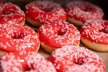close up of delicious looking pink donuts