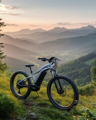 Obraz premium Electric bike on mountain landscape during sunset.