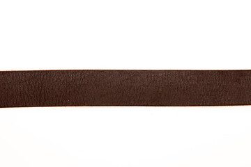 Part of Men's leather belt in a dark brown color on white background. Top view or flat lay, close-up.