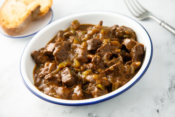 Beef ragout with pickled cucumber