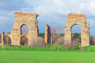 Roman aqueducts in Rome. Ancient Roman ruins and stone monuments at Via Appia Antica