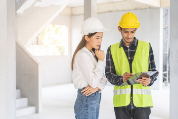 Builder team, foreman asian young engineer, architect man, woman working, discussing construction...