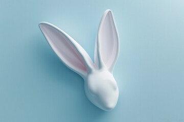Obraz premium White rabbit ear on pastel blue background. Easter day. 3d rendering, camera angle from above the rabbit ear, looking down
