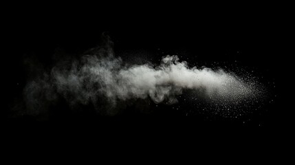 A cloud of white powder explodes against a black background, creating a dramatic and ethereal effect.