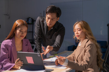 Female doctor is listening to the heartbeat of a senior man with a stethoscope, providing in-home healthcare and monitoring his vital signs